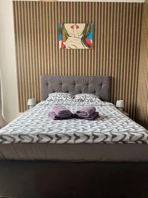 Łóżko lub łóżka w pokoju w obiekcie Wczasowa 3