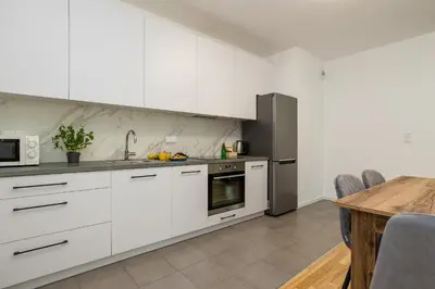 Kuchnia lub aneks kuchenny w obiekcie ShortStayPoland Sikorskiego (B103)