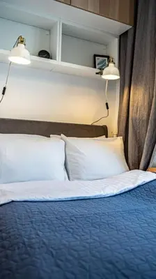 Łóżko lub łóżka w pokoju w obiekcie Mieszkanie z dużym terasem w Warszawie