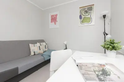 Łóżko lub łóżka w pokoju w obiekcie Warsaw Apartment Dolinka Batuty by Noclegi Renters