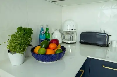 Kuchnia lub aneks kuchenny w obiekcie Nowy Apartment przy Placu Szembeka