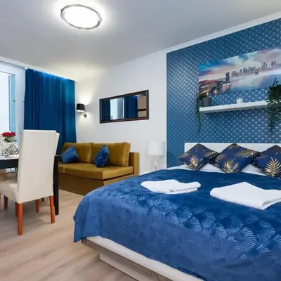 UnitApartments Rondo ONZ 3-pokojowe Apartamenty w Centrum Warszawy 1-8 osób Parking Metro WIFI Winda