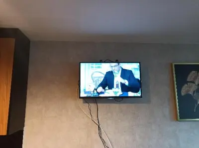 Telewizja i/lub zestaw kina domowego w obiekcie Green apartament w Centrum