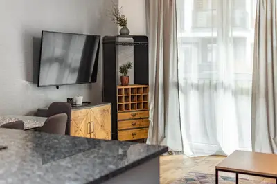 Telewizja i/lub zestaw kina domowego w obiekcie Jurajska 4 by Homeprime