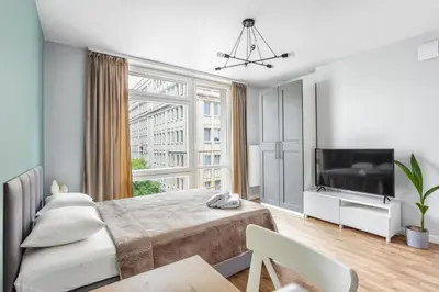 Telewizja i/lub zestaw kina domowego w obiekcie Charming Apartment in the City Center
