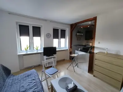 Telewizja i/lub zestaw kina domowego w obiekcie Gallery Apartament Metro Natolin