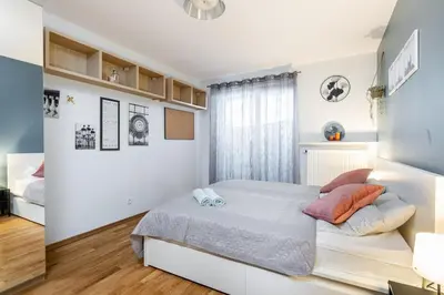Łóżko lub łóżka w pokoju w obiekcie Modern 2 Bedroom Apartment with Parking Bemowo
