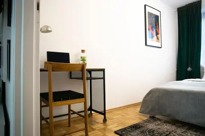 Łóżko lub łóżka w pokoju w obiekcie oompH Warsaw Center Well Designed Apartment with Balcony