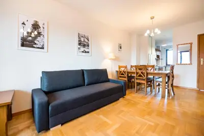 Część wypoczynkowa w obiekcie Woronicza Homey Wooden Apartment by BookingHost