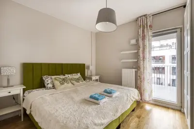 Łóżko lub łóżka w pokoju w obiekcie Gama Home Szwedzka 30