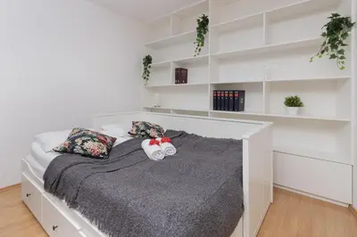 Łóżko lub łóżka w pokoju w obiekcie Warsaw Ursynów Modern Apartment by Noclegi Renters