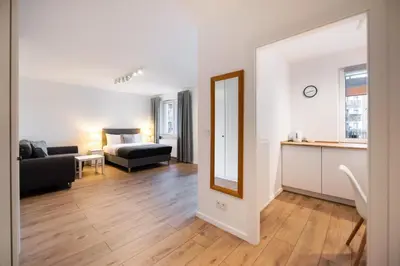 Część wypoczynkowa w obiekcie Develia Mała Praga Charming Studio by BookingHost