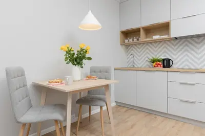 Kuchnia lub aneks kuchenny w obiekcie Metro Bielany Apartments with Parking by Noclegi Renters