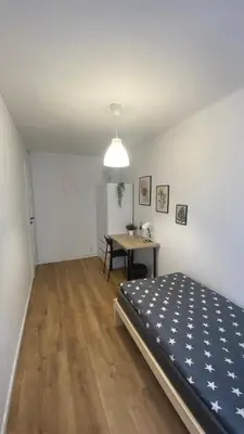 Łóżko lub łóżka w pokoju w obiekcie Warszawa Centrum Pokoje