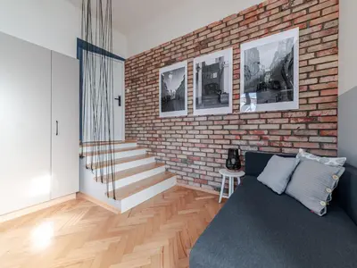Część wypoczynkowa w obiekcie Old Town Eclectic Apartment for 6 people by BookingHost