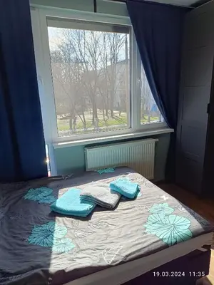 Łóżko lub łóżka w pokoju w obiekcie Apartament Magnolia