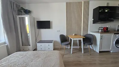 Telewizja i/lub zestaw kina domowego w obiekcie Apartament Dzielna