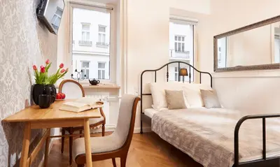 Łóżko lub łóżka w pokoju w obiekcie Mokotowska Place for You
