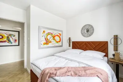 Łóżko lub łóżka w pokoju w obiekcie Piękny Apartament Fredola