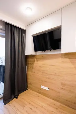 Telewizja i/lub zestaw kina domowego w obiekcie 7th Floor Atelier Praga Studio by BookingHost