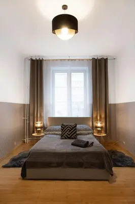 Łóżko lub łóżka w pokoju w obiekcie ClickTheFlat Aleje Niepodległości Center Apart Rooms