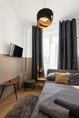 Łóżko lub łóżka w pokoju w obiekcie ClickTheFlat Aleje Niepodległości Center Apart Rooms