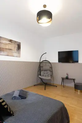 Łóżko lub łóżka w pokoju w obiekcie ClickTheFlat Aleje Niepodległości Center Apart Rooms