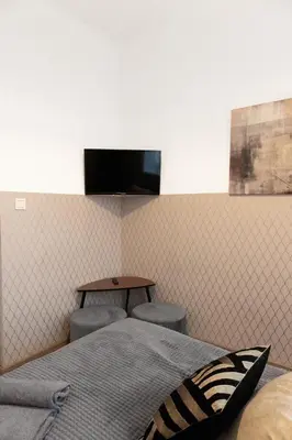 Telewizja i/lub zestaw kina domowego w obiekcie ClickTheFlat Aleje Niepodległości Center Apart Rooms
