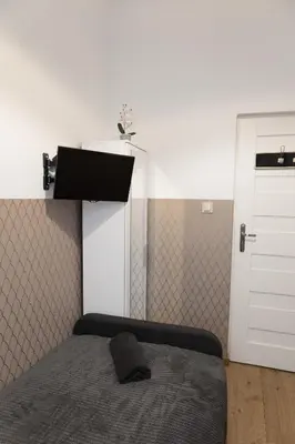 Łóżko lub łóżka w pokoju w obiekcie ClickTheFlat Aleje Niepodległości Center Apart Rooms