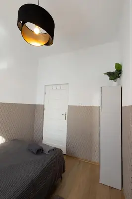 Łóżko lub łóżka w pokoju w obiekcie ClickTheFlat Aleje Niepodległości Center Apart Rooms