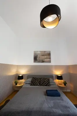 Łóżko lub łóżka w pokoju w obiekcie ClickTheFlat Aleje Niepodległości Center Apart Rooms