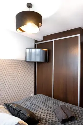 Łóżko lub łóżka w pokoju w obiekcie ClickTheFlat Piękna Center Apart Rooms
