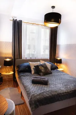 Łóżko lub łóżka w pokoju w obiekcie ClickTheFlat Piękna Center Apart Rooms