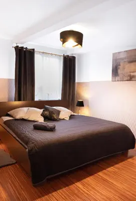 Łóżko lub łóżka w pokoju w obiekcie ClickTheFlat Piękna Center Apart Rooms