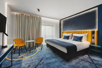 Łóżko lub łóżka w pokoju w obiekcie Stay inn Hotel Warszawa
