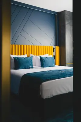 Łóżko lub łóżka w pokoju w obiekcie Stay inn Hotel Warszawa