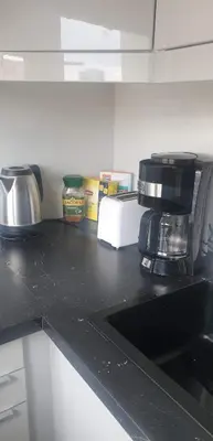 Kuchnia lub aneks kuchenny w obiekcie Apartament Złota 60- Warsaw