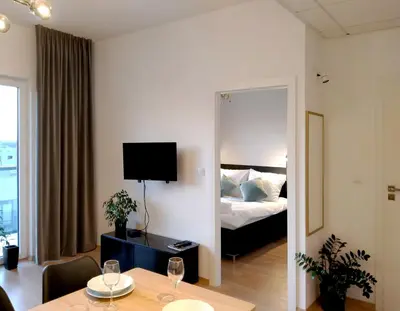 Łóżko lub łóżka w pokoju w obiekcie Apartament 9, z oddzielną sypialnią!