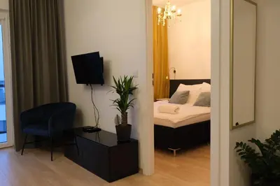 Łóżko lub łóżka w pokoju w obiekcie Apartament 9, z oddzielną sypialnią!
