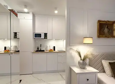 Kuchnia lub aneks kuchenny w obiekcie Apartament zielony Mokotów