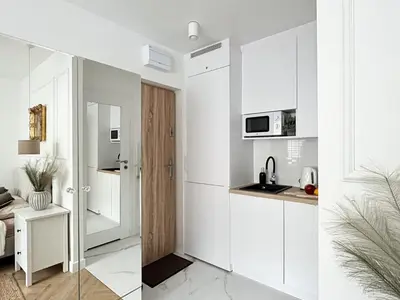 Kuchnia lub aneks kuchenny w obiekcie Apartament zielony Mokotów
