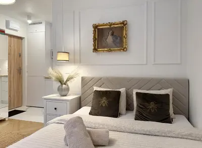 Łóżko lub łóżka w pokoju w obiekcie Apartament zielony Mokotów
