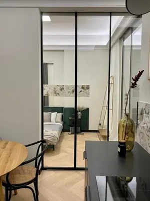 Łóżko lub łóżka w pokoju w obiekcie AK Apartments