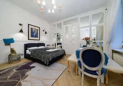 Łóżko lub łóżka w pokoju w obiekcie Apartament Żurawia street