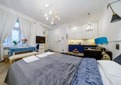 Łóżko lub łóżka w pokoju w obiekcie Apartament Żurawia street