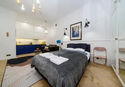 Łóżko lub łóżka w pokoju w obiekcie Apartament Żurawia street