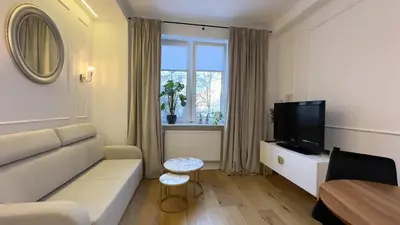 Telewizja i/lub zestaw kina domowego w obiekcie Apartament Centrum Marszałkowska 28 - pl. Zbawiciela