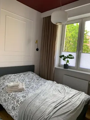 Łóżko lub łóżka w pokoju w obiekcie Apartament Centrum Marszałkowska 28 - pl. Zbawiciela