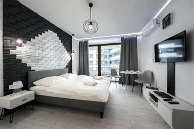 Łóżko lub łóżka w pokoju w obiekcie Mayad Residence