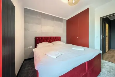 Łóżko lub łóżka w pokoju w obiekcie Mayad Residence